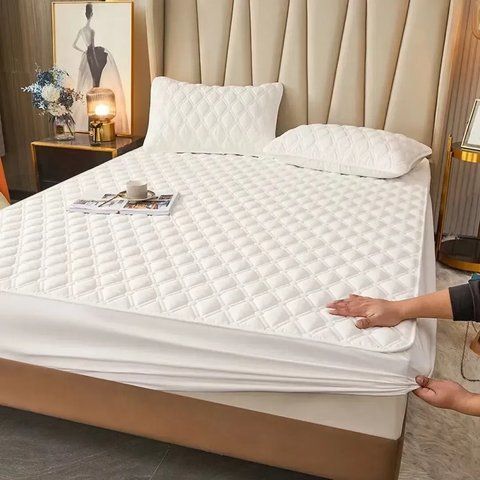Наматрацник непромокальний з бортами / Водонепроникний стьобаний наматрацник 160х200см Білий G6625/1 фото